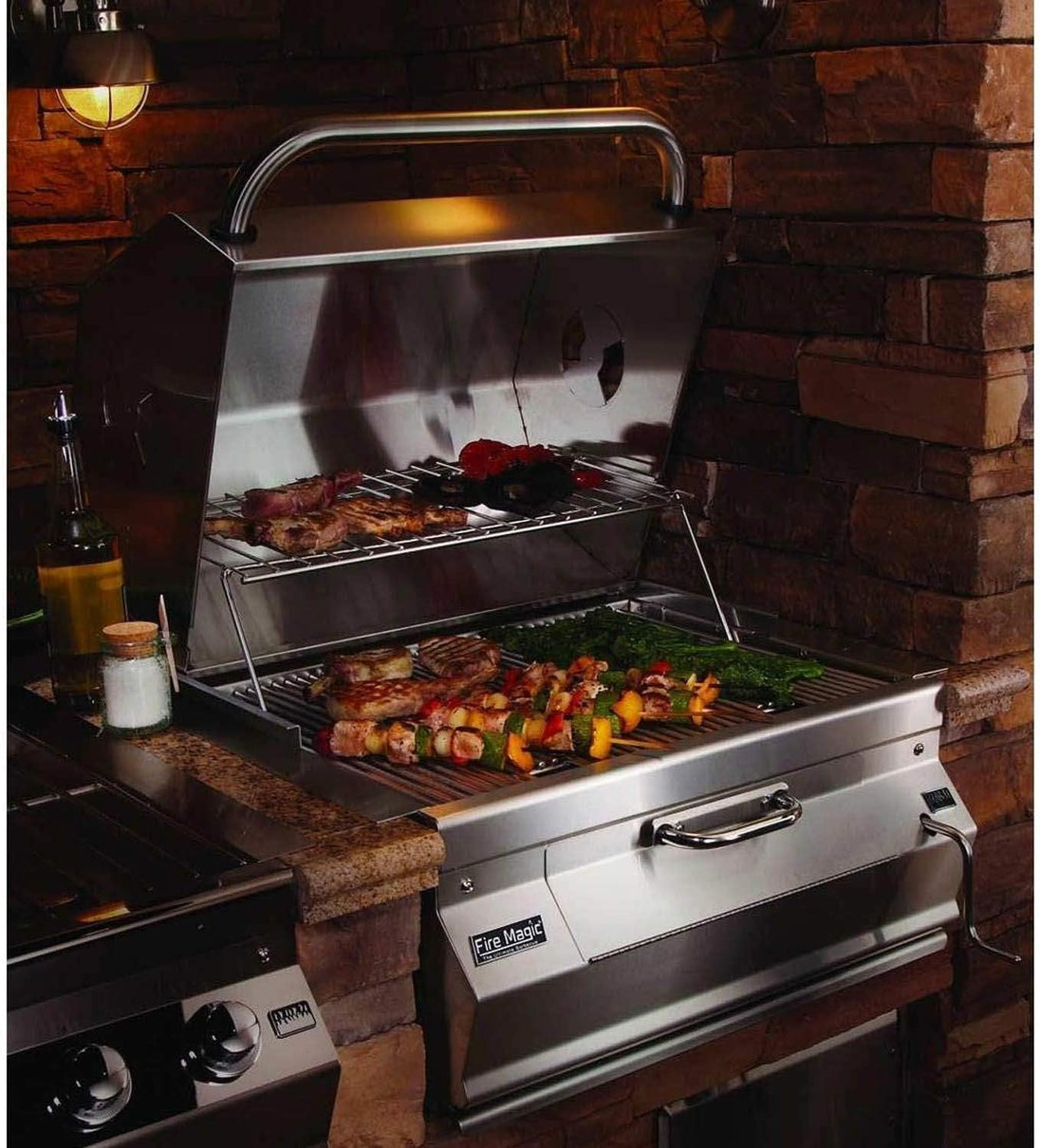 Fire Magic charcoal smoker grill with adjustable charcoal tray